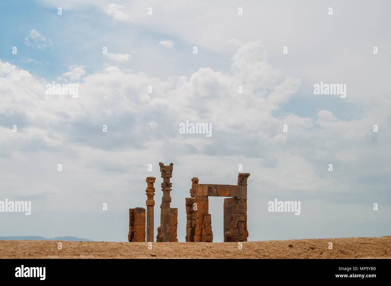 Persepolis, Iran - April 28, 2018: The ancient tombs of Achaemenid dynasty Kings of Persia are carved in rocky cliff in Naqsh-e Rustam, Iran Stock Photo