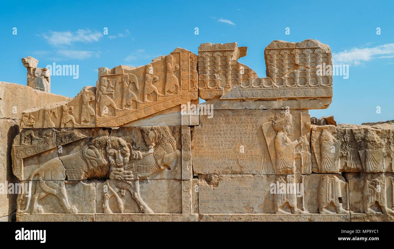 Persepolis, Iran - April 28, 2018: The ancient tombs of Achaemenid dynasty Kings of Persia are carved in rocky cliff in Naqsh-e Rustam, Iran Stock Photo