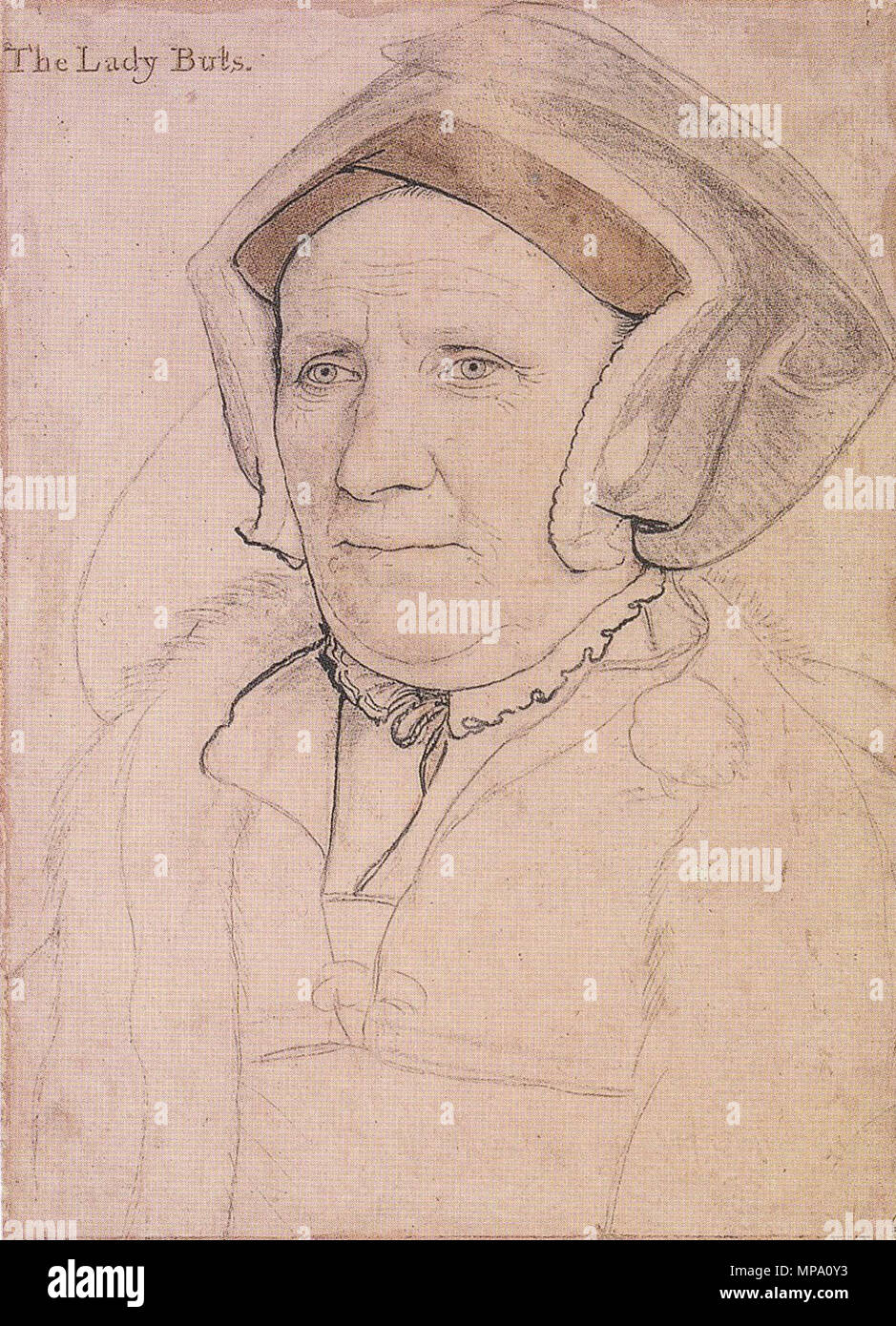 .  English: Portrait of Margaret, Lady Butts. Black and coloured chalks, metalpont, pen and brush and ink on pink-primed paper, 38 × 27.2 cm, Royal Collection, Windsor Castle. Margaret, Lady Butts, née Bacon, was the wife of Sir William Butts, physician to Henry VIII. She had served as a lady-in-waiting to Princess Mary. Holbein made this preliminary study for his oil portrait of Lady Margaret. He also painted an oil portrait of Sir William. Holbein is unsparing in his treatment of the 57-year-old's wrinkles. The drawing has been traced in metalpoint for transfer. Art historian K. T. Parker fo Stock Photo