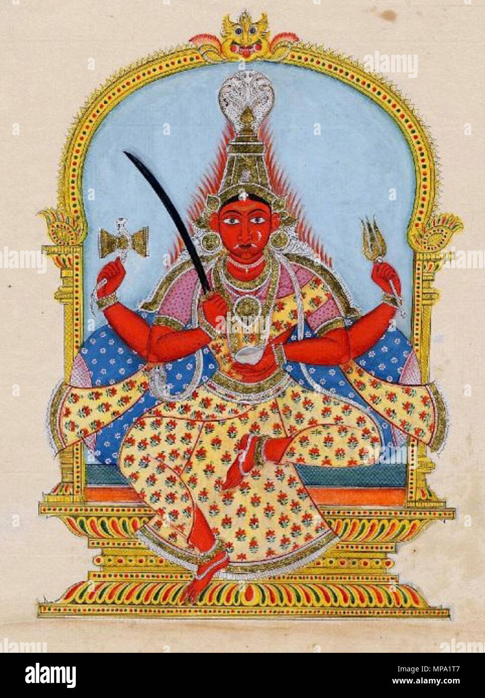 . English: 'Mariamman, sits in lalitasana on a throne. Around the throne is a metal frame culminating in a kirttimukha mask. Tongues of fire emanate from her head and shoulders, and two small fangs protrude from her mouth. In her upper right hand she carries a damaru (hourglass shaped drum), for which a cobra coiled around it serves as a handle. She holds a trishula (trident) in her upper left hand, a long sword in her lower right and a kapala (cup/alms bowl) in her lower left. A five-headed cobra rises above her crown.' . circa 1820. Unknown 859 Mariamman Stock Photo