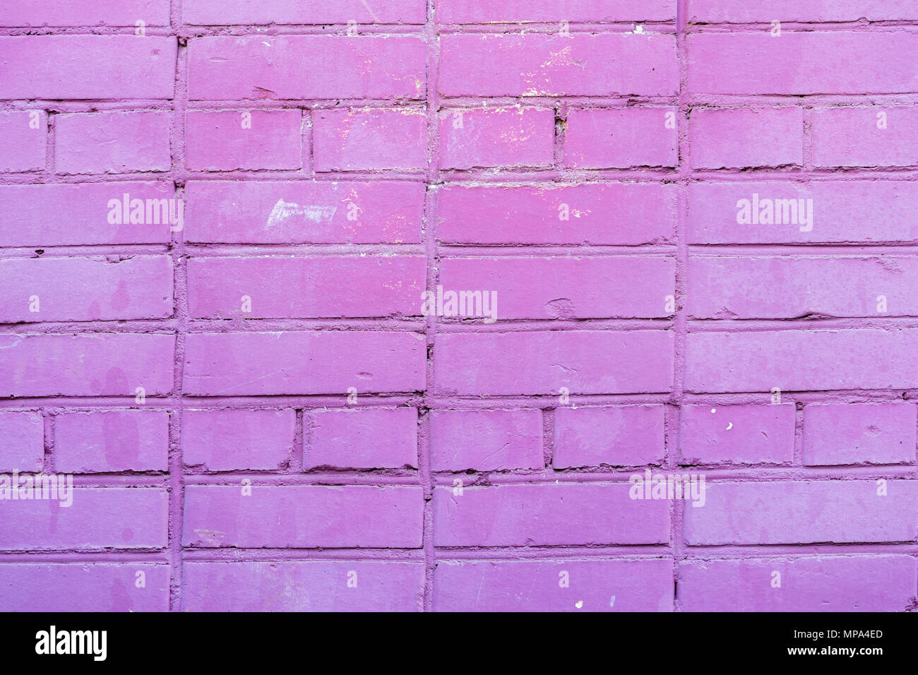Painted violet brick wall, urban background, space for text. Horizontal texture. Abstract modern backdrop, pattern, wallpaper, banner design, place for text Stock Photo