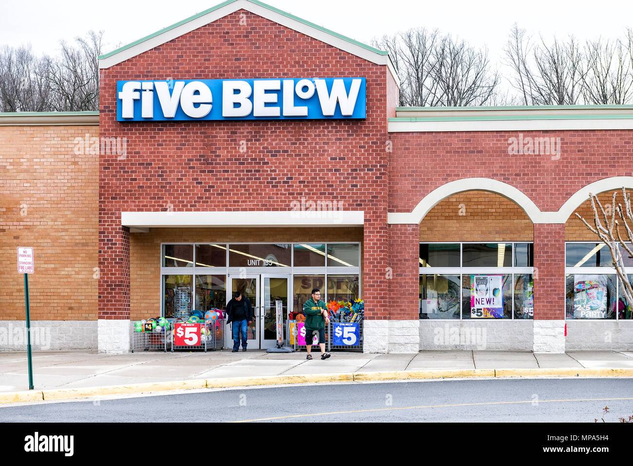 Sterling, USA - April 4, 2018: Five Below store in Fairfax county, Virginia shop exterior entrance with sign, logo, doors discount dollar chain for te Stock Photo