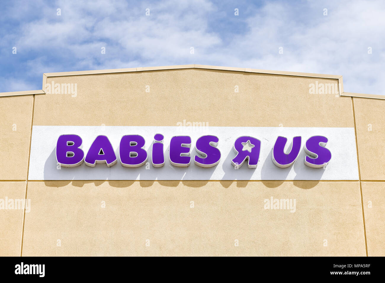 Sterling, USA - April 4, 2018: Babies R US store in Fairfax County, Virginia for children shop exterior entrance with sign, logo, closing going out of Stock Photo