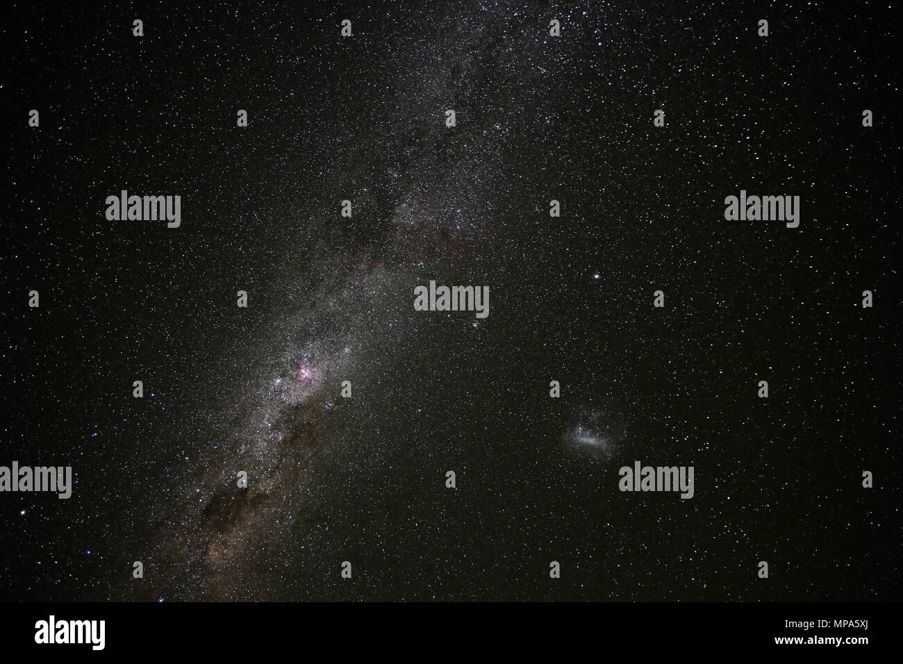 Milky way, stars and fogs in the Southern Hemisphere, Elqui Valley, Chile Stock Photo