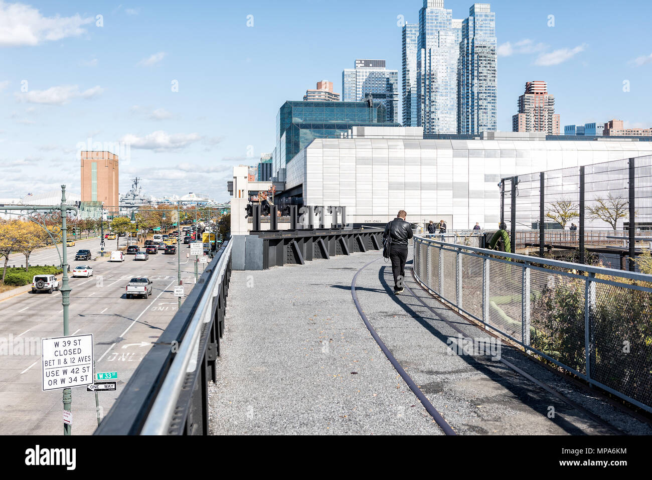 New York City, USA - October 30, 2017: Highline, high line, urban in NYC with people tourists walking in Chelsea West Side by Hudson Yards in autumn f Stock Photo