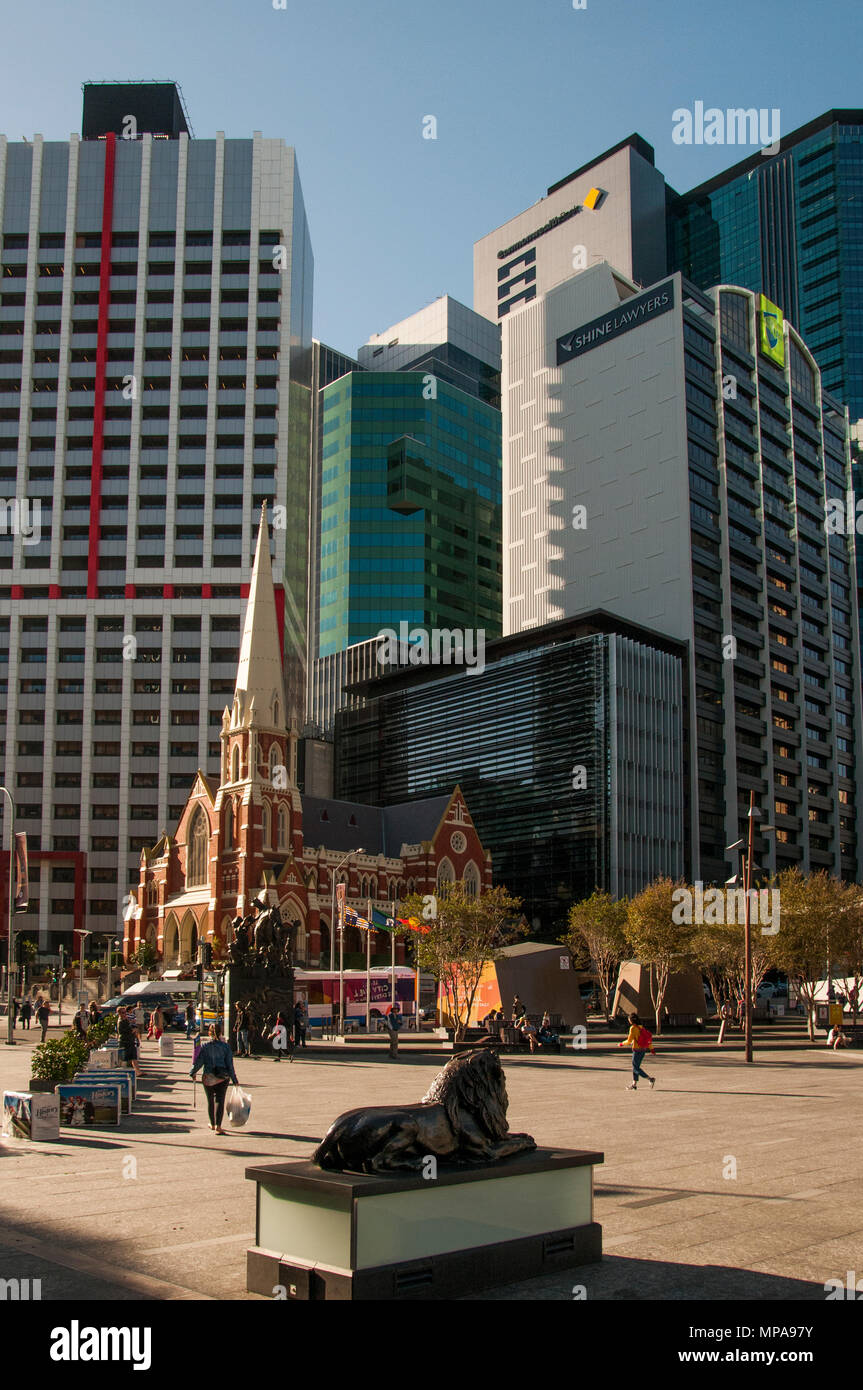 The heritage-listed Albert Street Uniting Church (1889) contrasts with surrounding office towers at Town Hall Square, Brisbane, Queensland, Australia Stock Photo