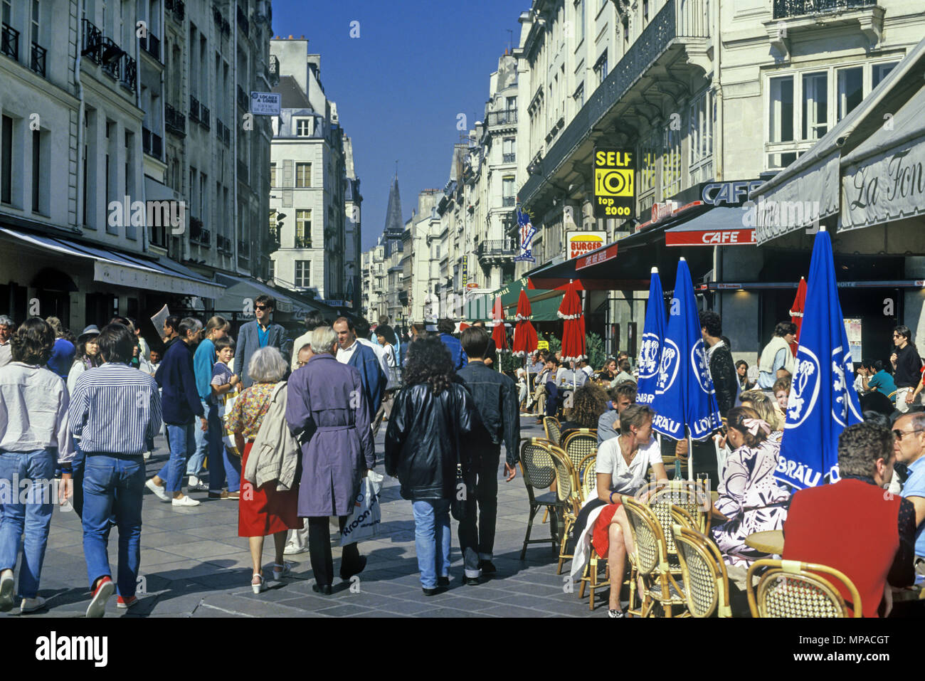 1988 HISTORICAL OUTDOOR CAFES RUE SAINT DENIS PARIS FRANCE Stock Photo