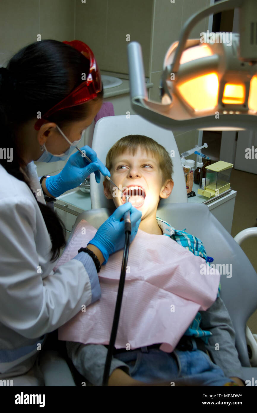 Shot of a little boy with a doctor in a dental surgery. Healthcare