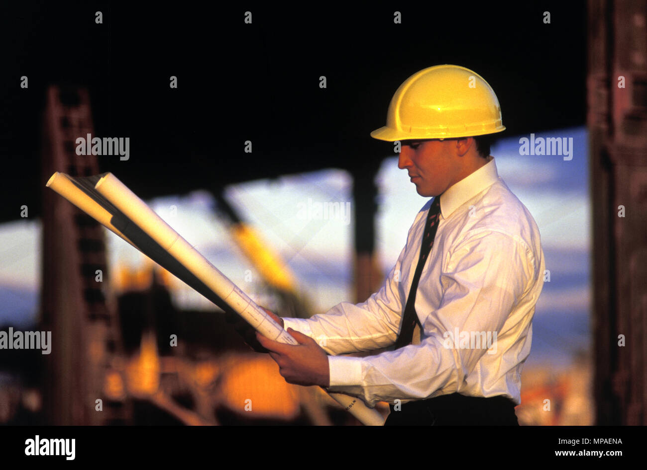 Contruction Paper Man 1988 HISTORICAL MAN HOLDING PAPER BUILDING PLANS ON COMMERCIAL ...