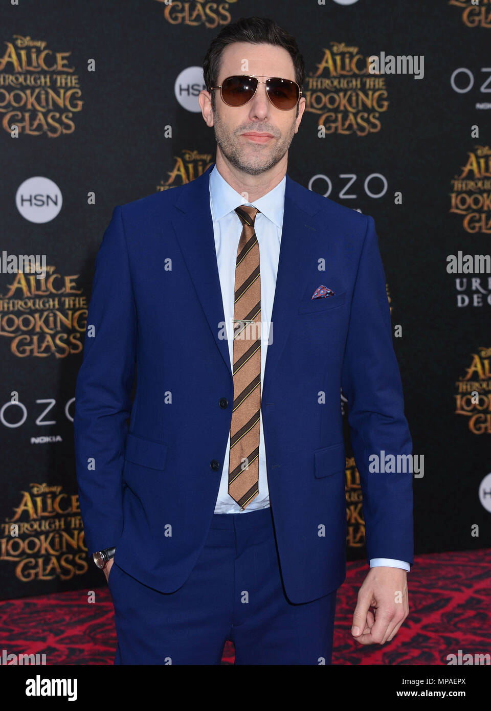Sacha Raron Cohen 230  at the Alice Through the Looking Glass Premiere at the El Capitan Theatre in Los Angeles. May 23, 2016.Sacha Raron Cohen 230 ------------- Red Carpet Event, Vertical, USA, Film Industry, Celebrities,  Photography, Bestof, Arts Culture and Entertainment, Topix Celebrities fashion /  Vertical, Best of, Event in Hollywood Life - California,  Red Carpet and backstage, USA, Film Industry, Celebrities,  movie celebrities, TV celebrities, Music celebrities, Photography, Bestof, Arts Culture and Entertainment,  Topix, Three Quarters, vertical, one person,, from the year , 2016,  Stock Photo