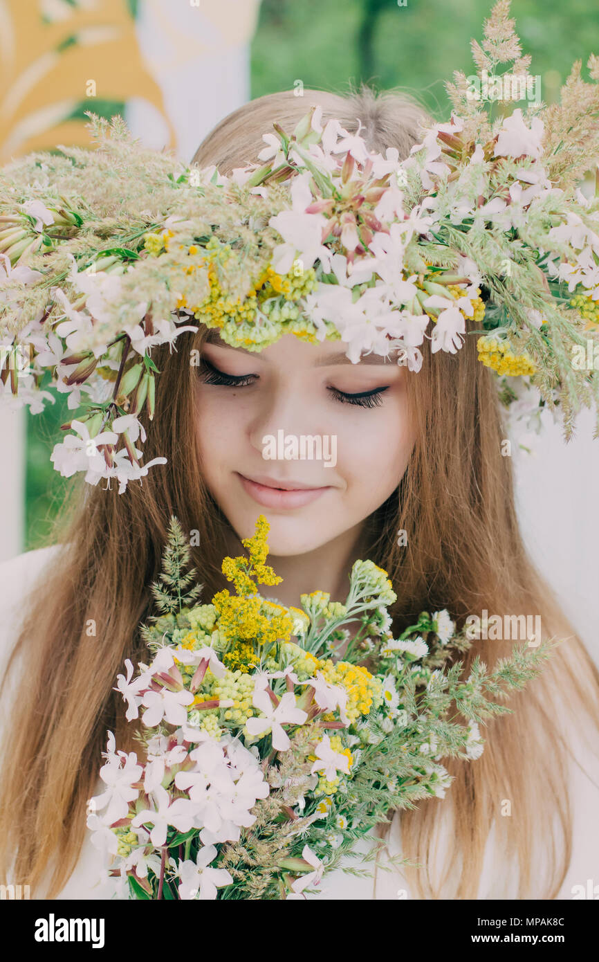 Beautiful Woman With A Wreath On Her Head From Real Flowers Stock Photo Alamy