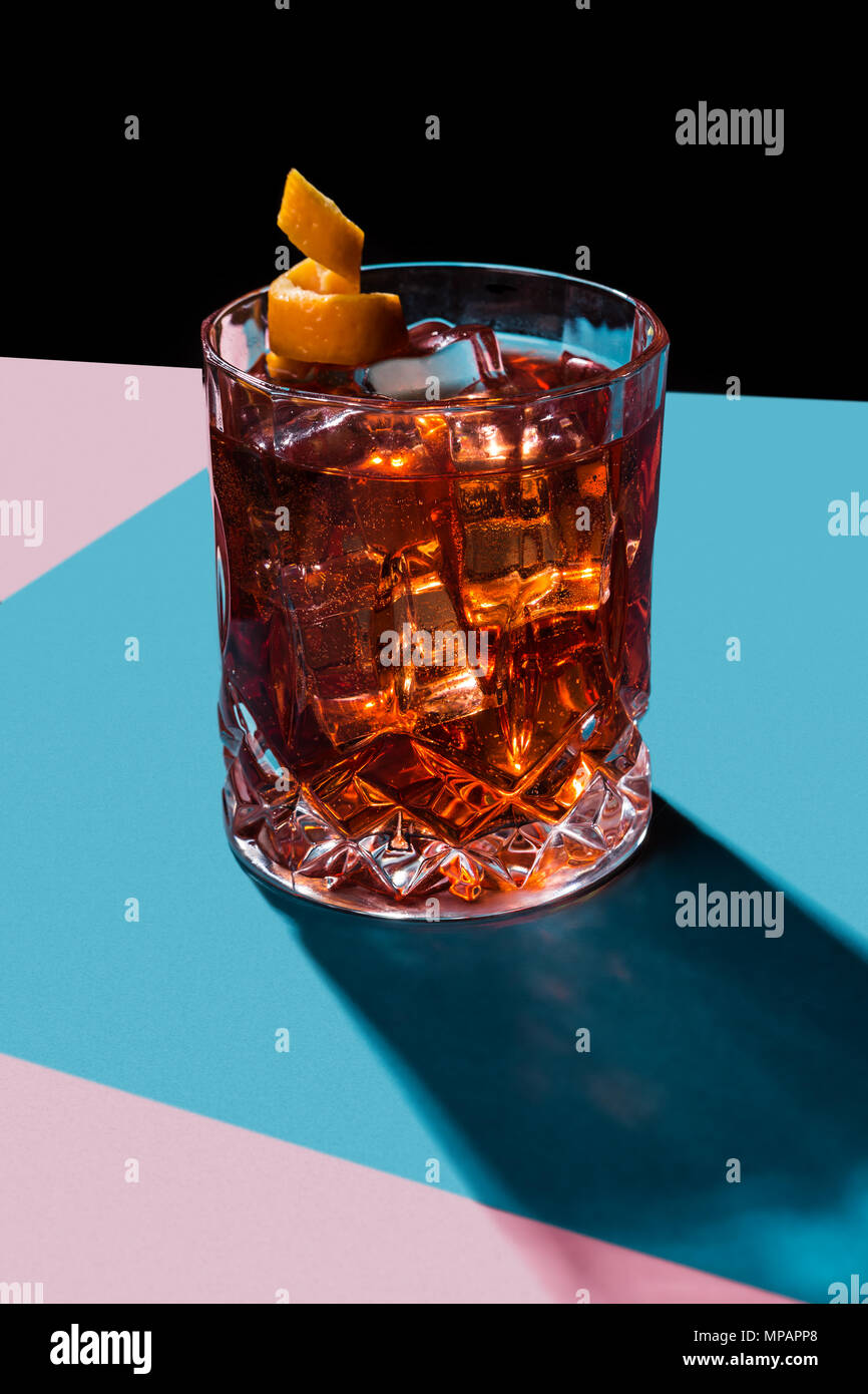 Negroni IBA cocktail, with gin, bitter, vermut, in pop contemporary