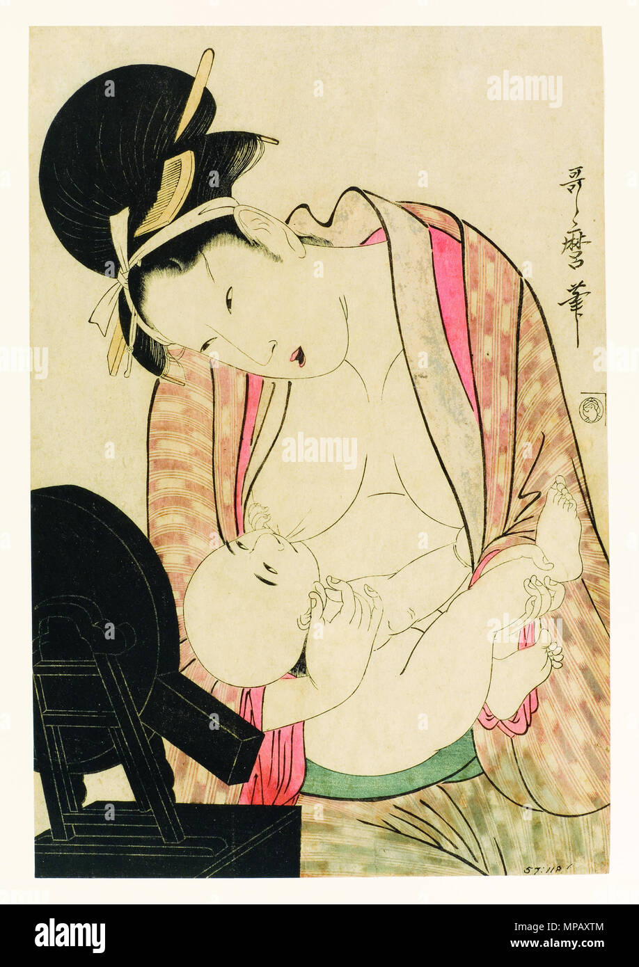 . English: Accession Number: 1957.118 Display Artist: Kitagawa Utamaro Display Title: Mother nursing her child before a mirror stand Creation Date: ca. 1800-1804 Height: 14 13/16 in. Width: 9 3/4 in. Display Dimensions: 14 13/16 in. x 9 3/4 in. (37.62 cm x 24.77 cm) Credit Line: Bequest of Mrs. Cora Timken Burnett Label Copy: Esta estampa pertenece a una serie del Tokaido llamada reisho por el estilo caligrfico de letras cuadradas con el cual est escrito el ttulo en rojo sobre la cartela grande en la derecha superior. Collection: <a href='http://www.sdmart.org/art/our-collection/asian-art' rel Stock Photo