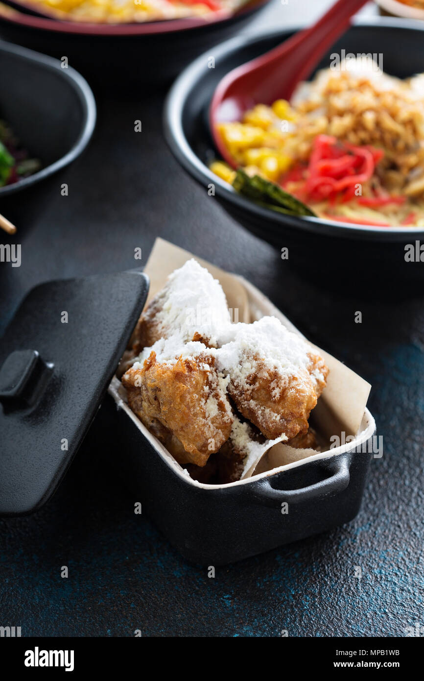 Asian style fried donuts with powdered sugar Stock Photo