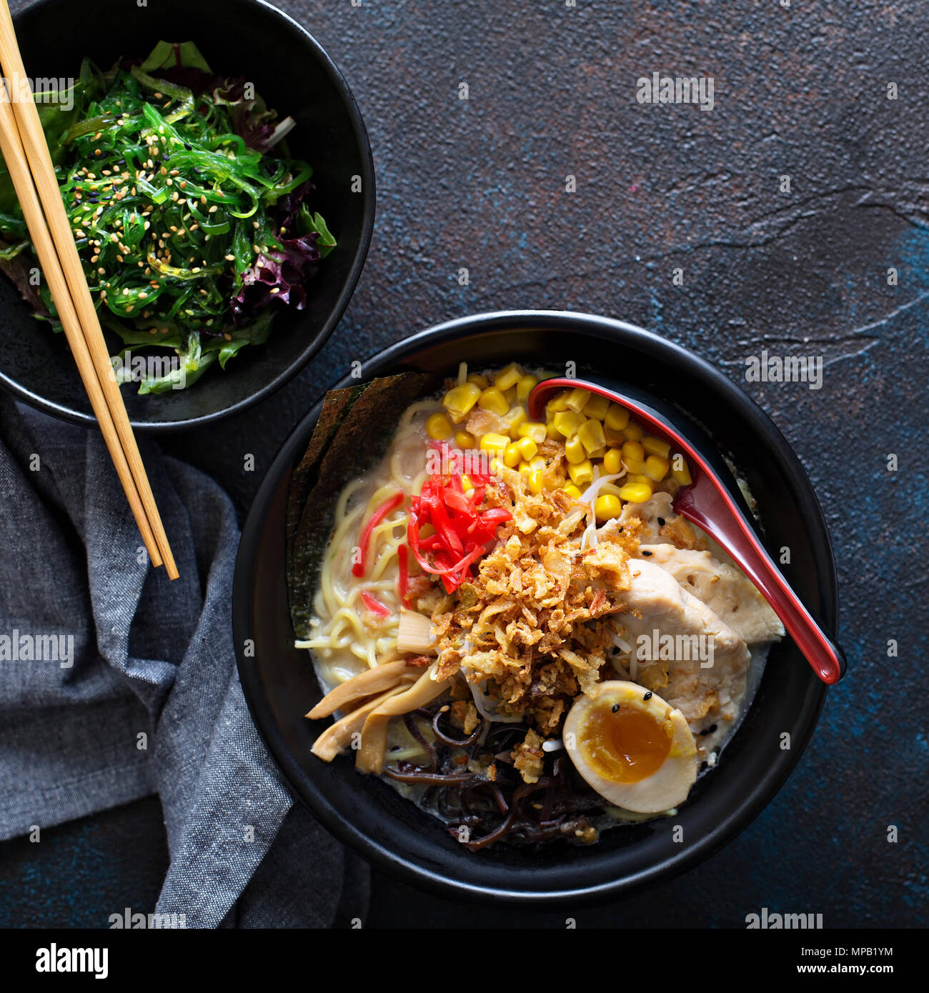 Spicy ramen bowls with noodles, pork and chicken Stock Photo Alamy