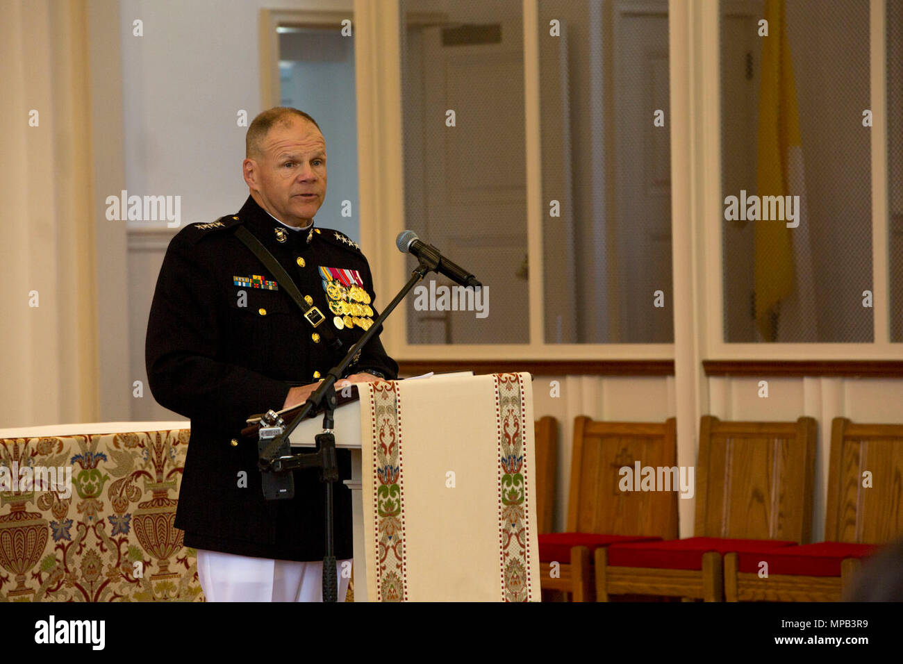 Commandant of the Marine Corps Gen. Robert B. Neller gives remarks during the memorial service of retired U.S. Marine Corps Lt. Gen. Lawrence F. Snowden at the U.S. Marine Memorial Chapel, Quantico, Va., April 8, 2017. Snowden retired in 1979 after nearly 40 years of service, fought in engagements during World War II, the Korean War, and Vietnam. He passed away Feb. 18, 2017. He was prominently known after retirement for organizing joint 'Reunion of Honor' missions which is an opportunity for Japanese and U.S. veterans and their families, dignitaries, leaders and service members from both nati Stock Photo