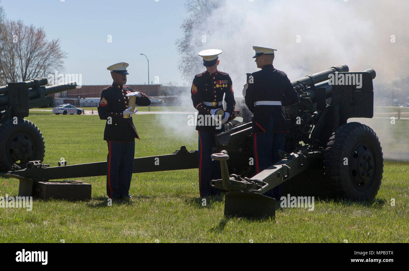 U. S. Marines with Marine Corps Base Quantico fire a battery salute from a 155mm Howitzer during the memorial service of retired U.S. Marine Corps Lt. Gen. Lawrence F. Snowden at the U.S. Marine Memorial Chapel, Quantico, Va., April 8, 2017. Snowden retired in 1979 after nearly 40 years of service, fought in engagements during World War II, the Korean War, and Vietnam. He passed away Feb. 18, 2017. He was prominently known after retirement for organizing joint 'Reunion of Honor' missions which is an opportunity for Japanese and U.S. veterans and their families, dignitaries, leaders and service Stock Photo