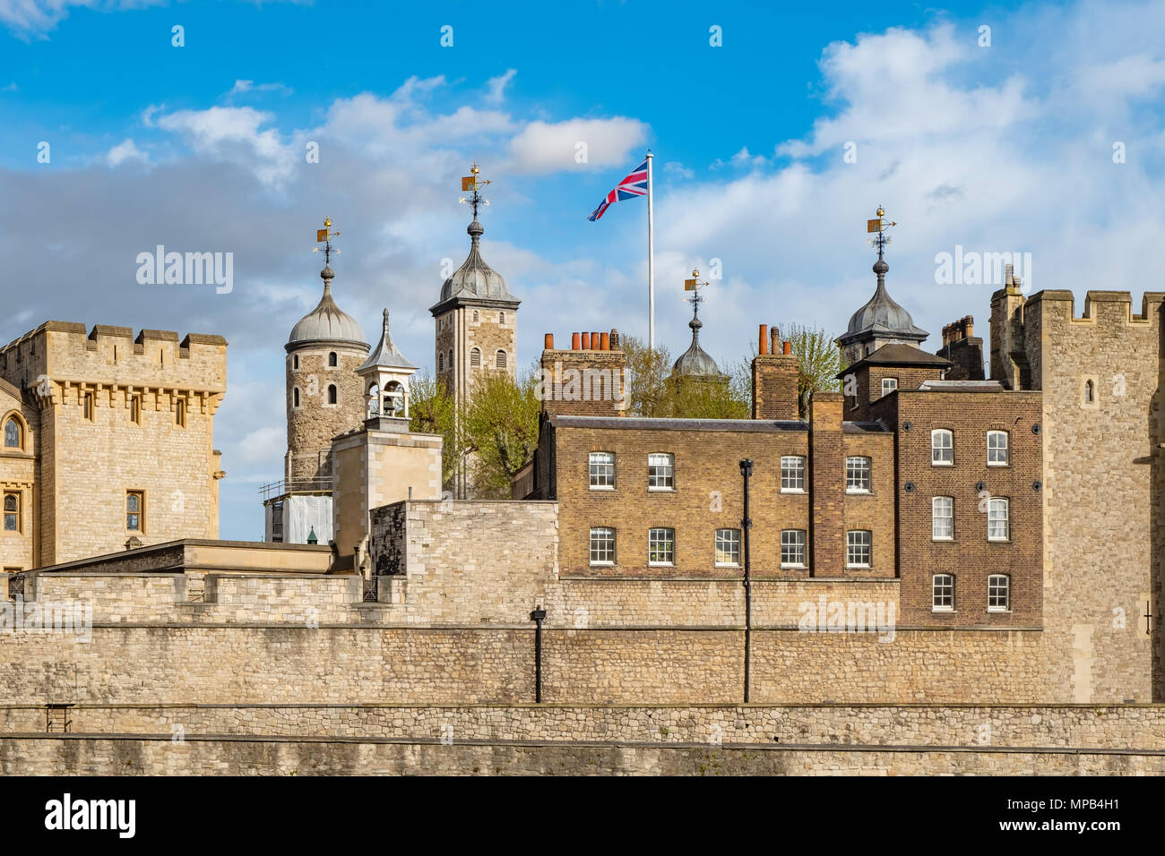 The Tower of London has served as a royal palace and a notorious prison.  Today it is a very popular tourist attraction and as well it houses the crow Stock Photo