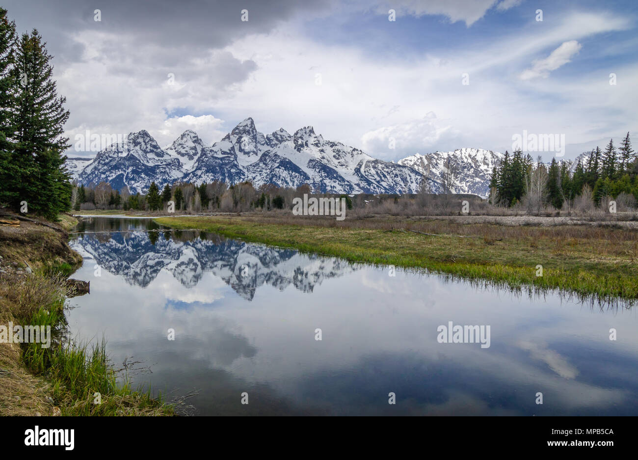 A beautiful Reflection of the iconic Grand Teton  Mountains at Schwabachers Landing. Stock Photo