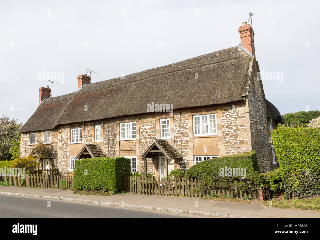 Terrace of historic thatched cottages at village of Sandy Lane