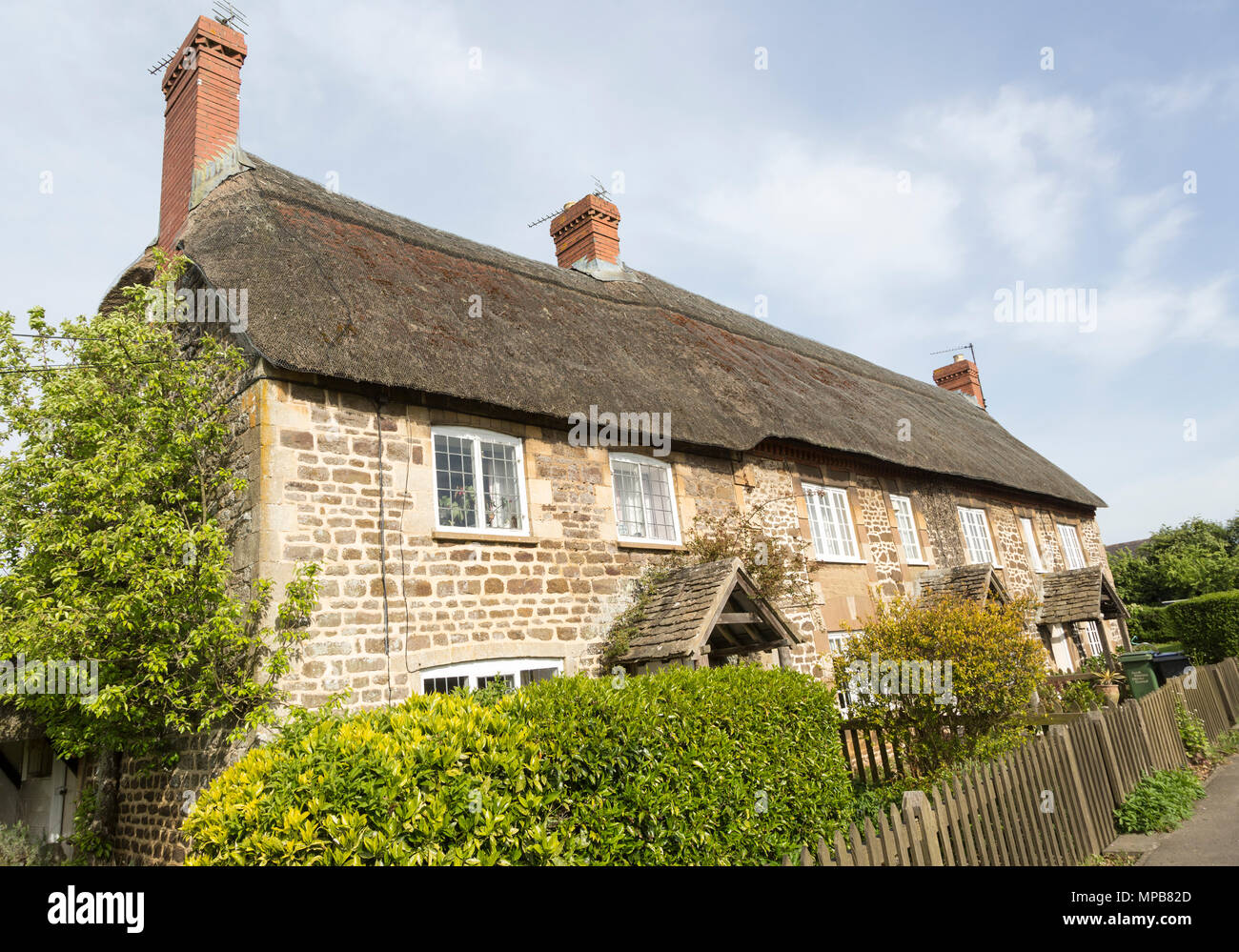 Terrace Of Historic Thatched Cottages At Village Of Sandy Lane