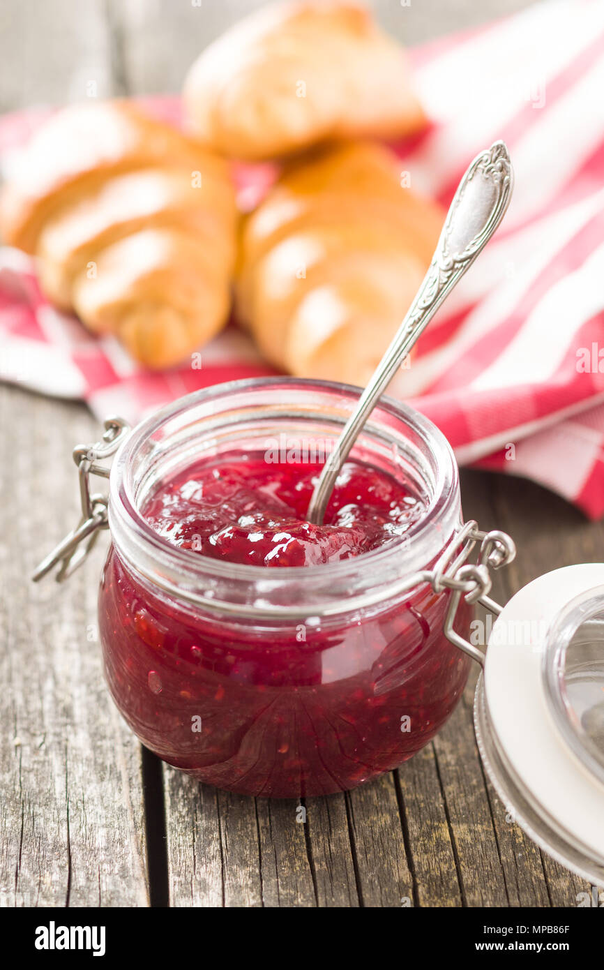 Raspberry jam jelly in jar. Stock Photo