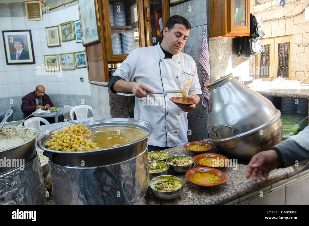 Hashem Restaurant, downtown Amman, Jordan. Fuul, Falafel and Hummus being  prepared at the legendary eatery Stock Photo - Alamy
