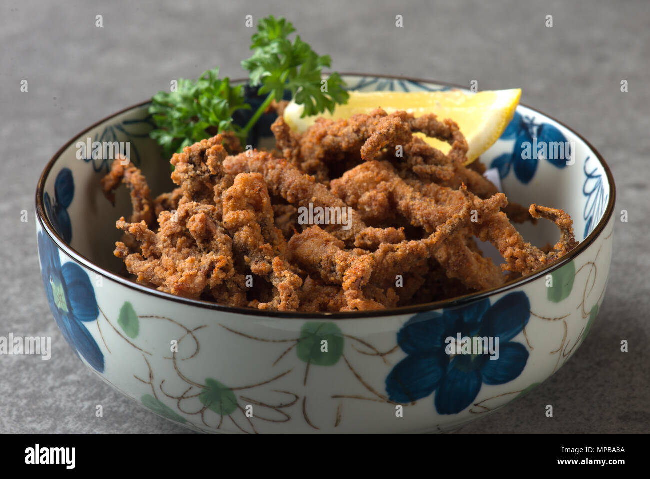 Ika Geso japanese fried spicy squid tentacle Stock Photo - Alamy