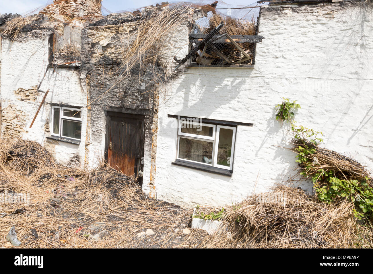 Country cottage homes burnt out destroyed by fire left in ruins