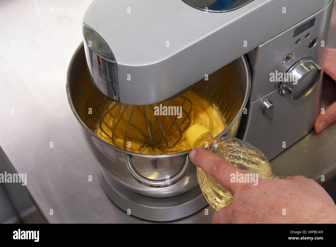 preparation of the mayonnaise egg with a kitchen robot, in the kitchen of a  restaurant Stock Photo - Alamy