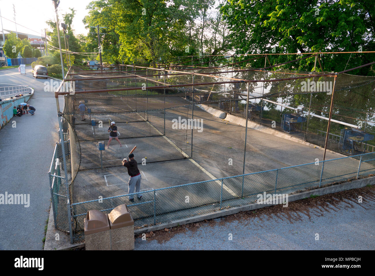 USA Pennsylvania PA Harrisburg State Capitol batting cages on City Island in the Susquehanna River Stock Photo