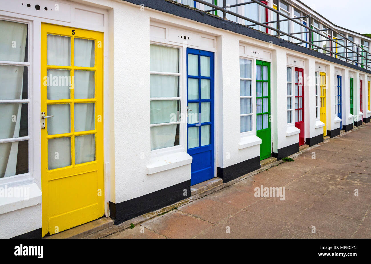 Colourful Doors on the Porthgwidden Beach Huts, St Ives, Cornwall, UK Stock Photo