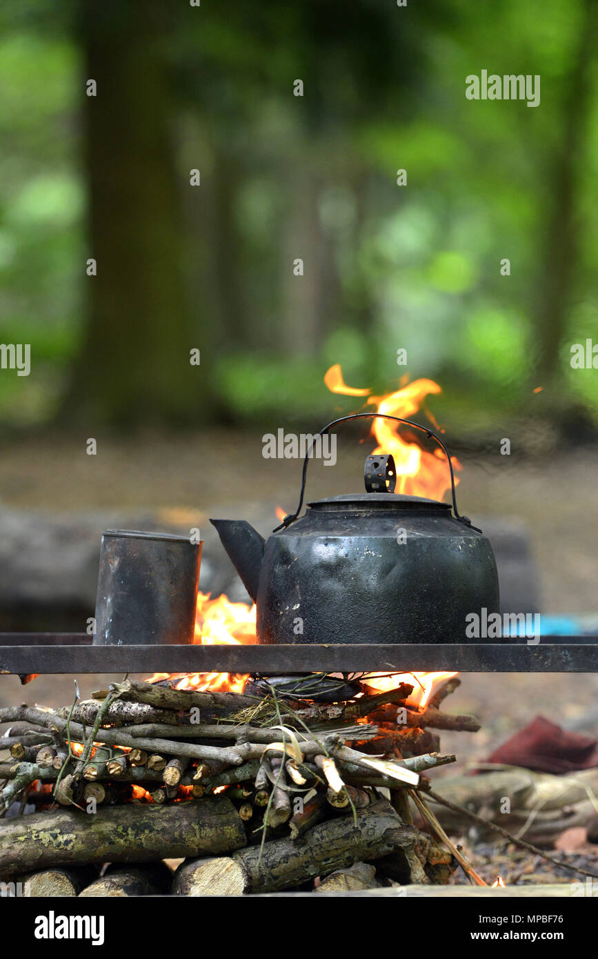 Blackened kettle on an open campfire Stock Photo Alamy