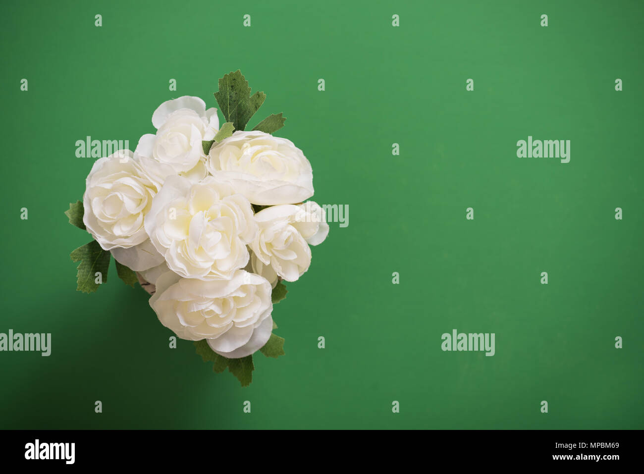 Reusable artificial flowers made from cloth and plastic. Stock Photo