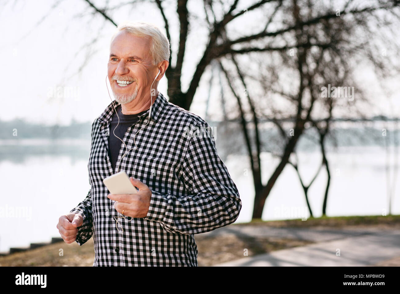 Running pensioner man hi-res stock photography and images - Alamy
