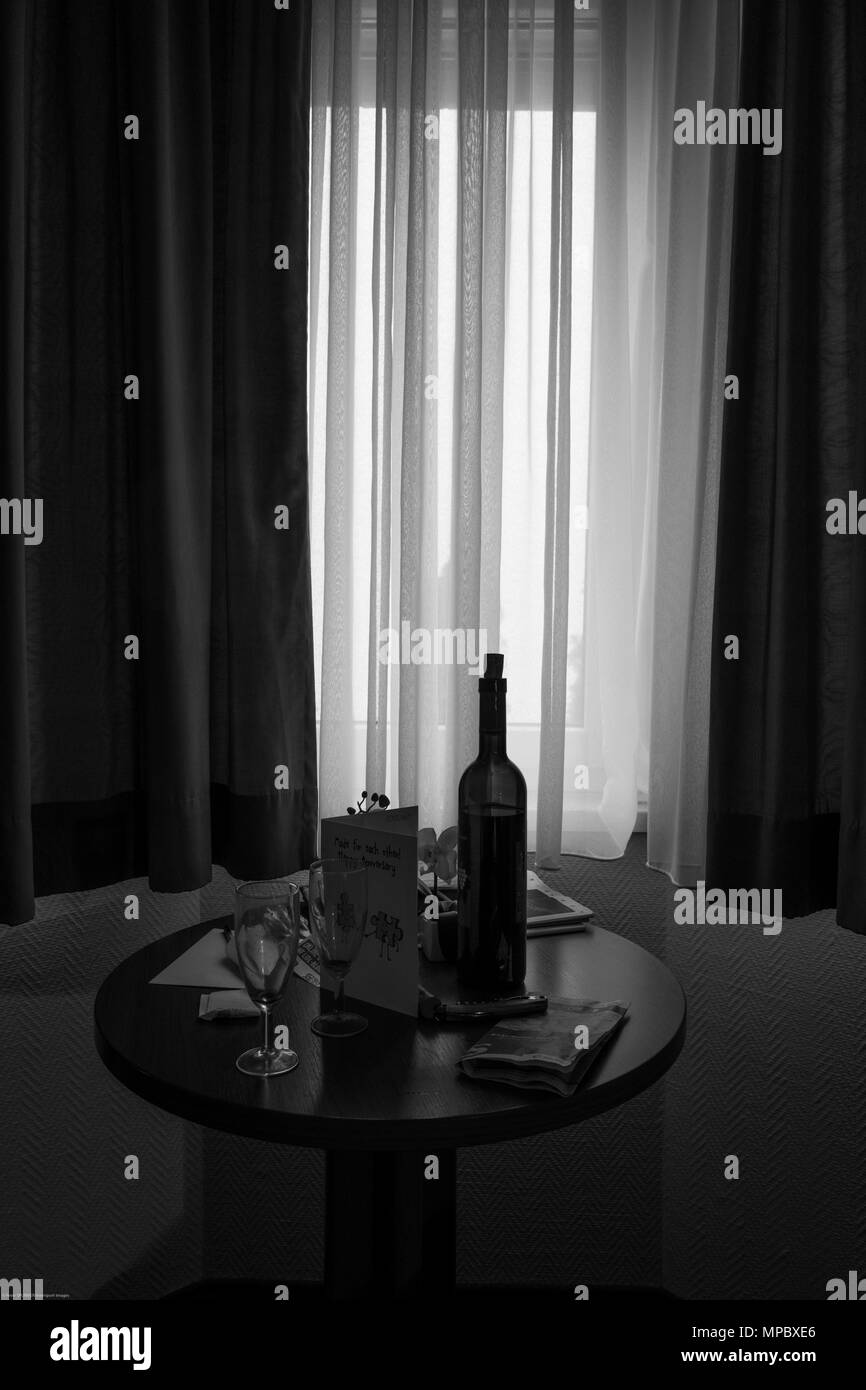 31st August 2017, Staaken, Berlin, GERMANY. Wine Bottle, Glasses, Table and Anniversary Card. © Peter SPURRIER, Stock Photo