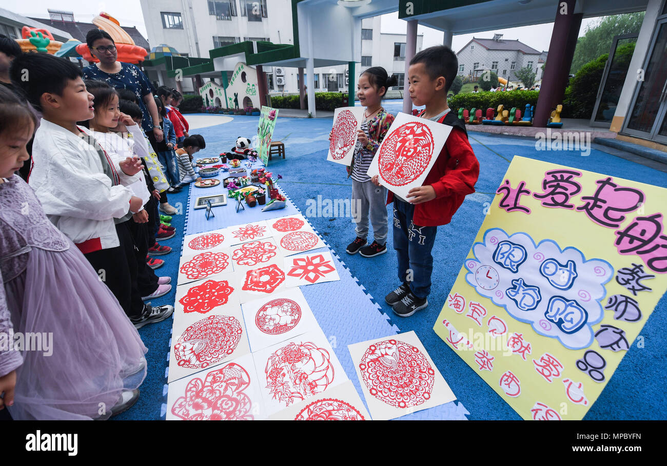 Children Introduce Paper Cuttings In A Charity Bazaar During Campus Cutting Festival At Kindergarten Changxing County East Chinas Zhejiang Children Introduce Paper Cuttings In A Charity Bazaar During Campus Cutting Festival At Kindergarten Changxing County East Chinas Zhejiang