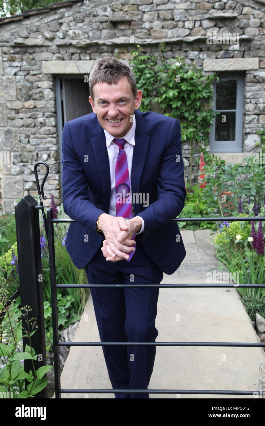 Chelsea, London, UK. 21st May, 2018. Chelsea, London, UK. 21st May 2018. Matthew Wright on the Welcome to Yorkshire garden at Chelsea Flower Show 2018, designed by Mark Gregory for Landformconsultants.co.uk Credit: Jenny Lilly/Alamy Live News Stock Photo