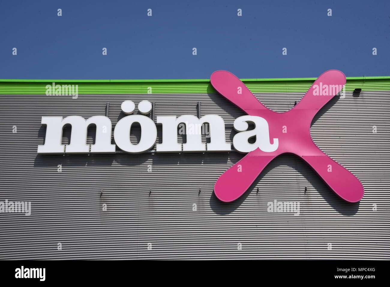 20 May 2018, Germany, Aachen: The logo of the furniture store Moemax, a company of the XXXLutz Group. · NO WIRE SERVICE · Photo: Horst Galuschka/dpa/Horst Galuschka dpa Stock Photo