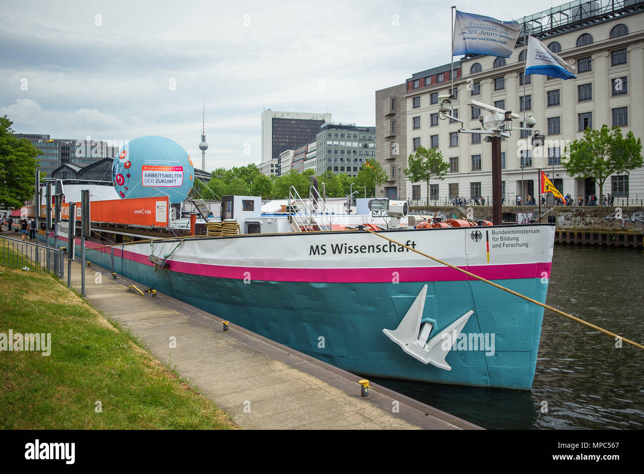 15 May 2018, Germany, Berlin: The exhibition ship 'MS Wissenschaft' (lit. motor vessel science) of the Federal Ministry of Education and Research in the port at Friedrichsstrasse railway station. During the summer months, the 'MS Wissenschaft' will be going on a Germany tour visiting about 40 cities with its exhibition on the topic of work environments of the future. Photo: Gregor Fischer/dpa Stock Photo