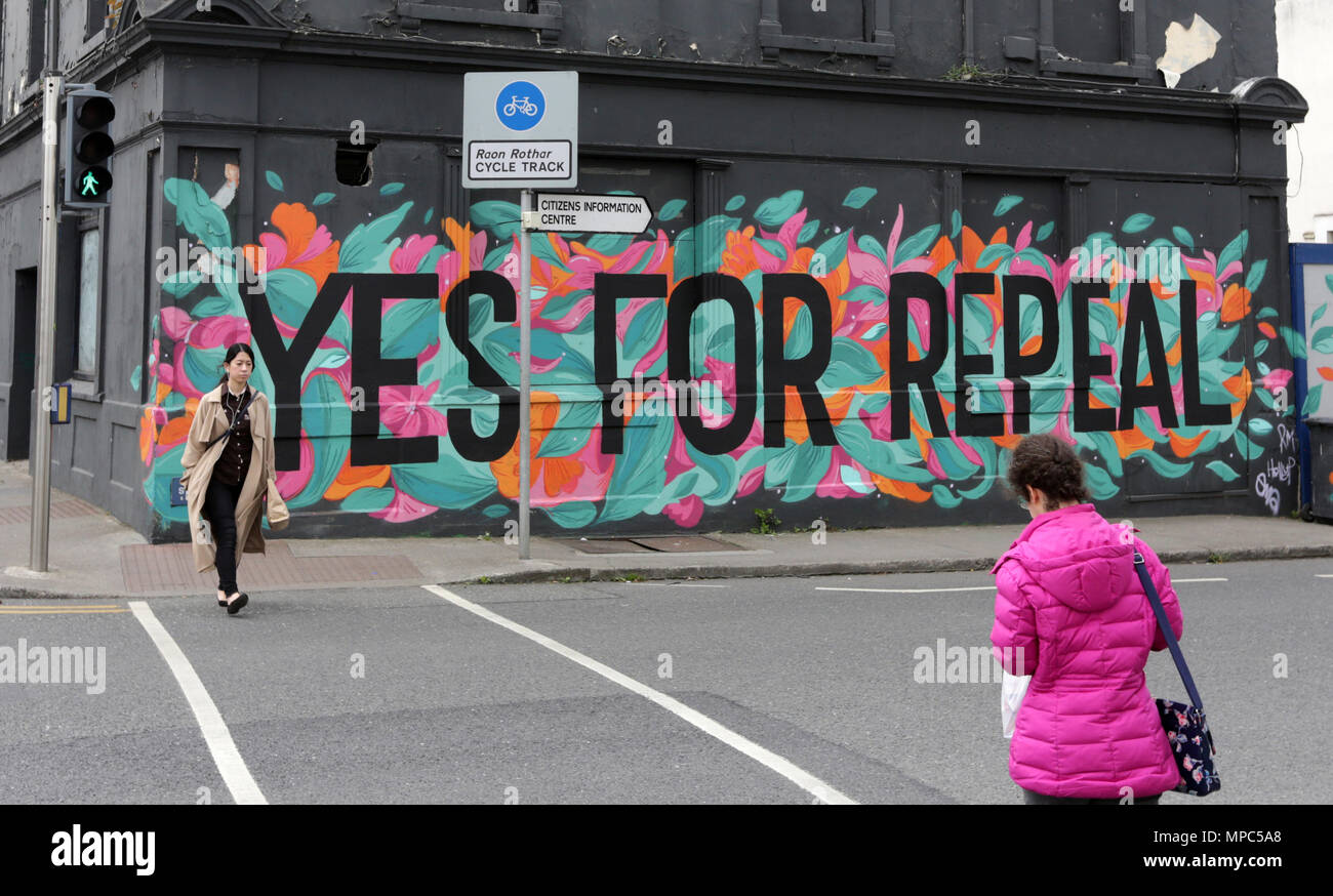 Dun Laoghaire, Ireland. 22nd May 2018. People pass a Pro-Choice mural in Dun Laoghaire, Ireland, today ahead of this Friday’s Referendum on whether or not to repeal the Eighth Amendment of the Irish constitution dealing with abortion.  Credit: Laura Hutton/Alamy Live News Stock Photo