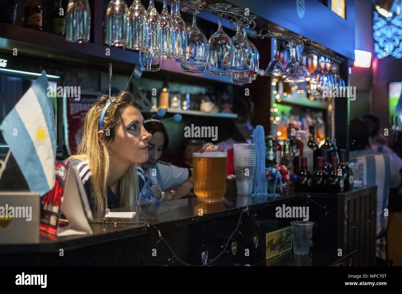 Buenos Aires, Buenos Aires, Argentina. 4th July, 2015. On a bar in Buenos  Aires, football fans gather to watch the National Team play a match. Bars  and restaurants, as much as homes,