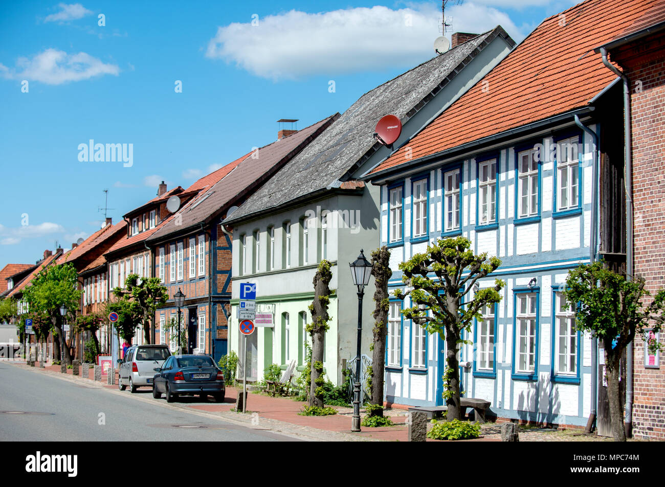 04 May 2018, Germany, Gartow: Historical houses are next to the main streat of the village in the district Luechow-Dannenberg. Photo: Hauke-Christian Dittrich/dpa Stock Photo