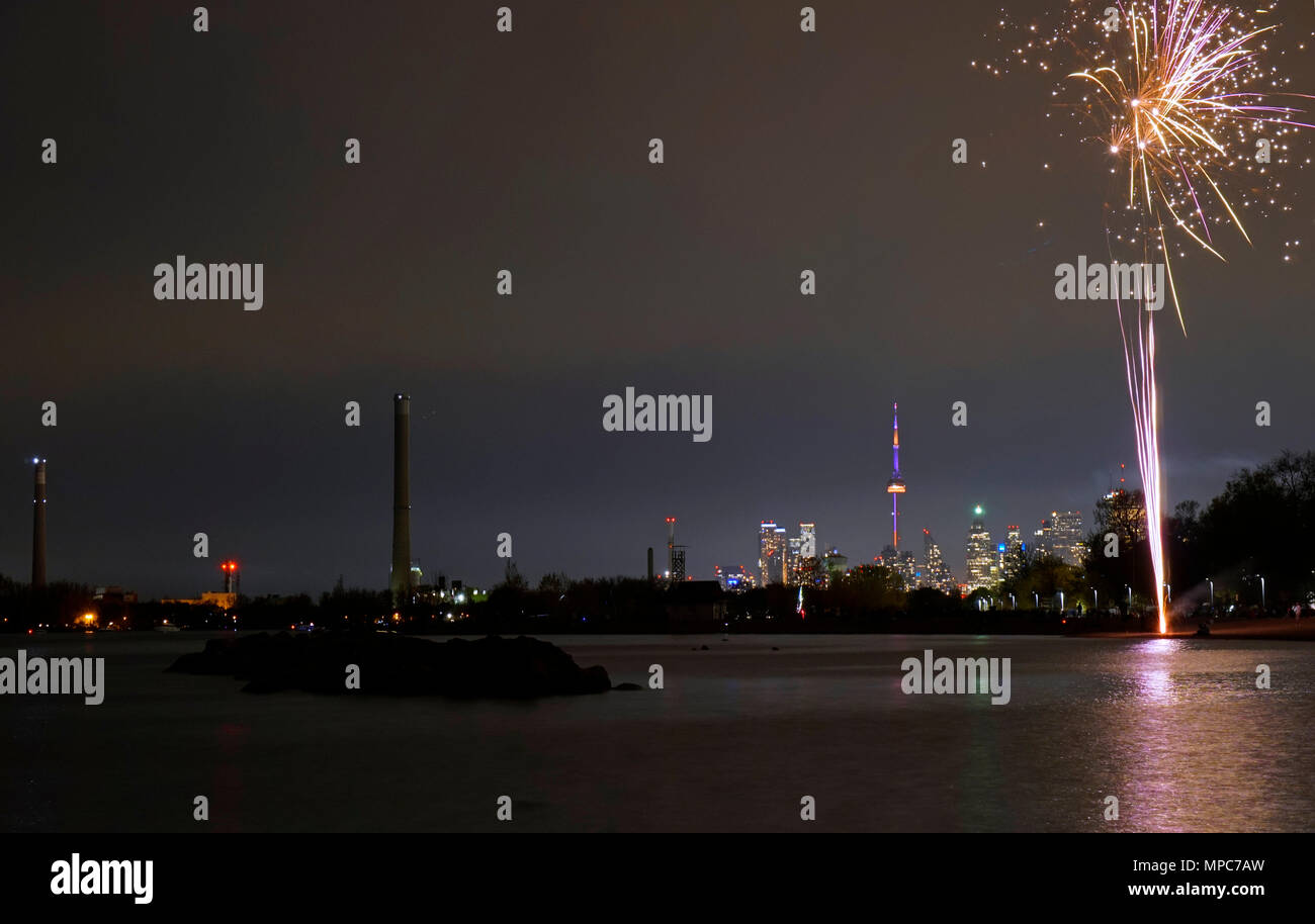 Fireworks on the beach of Ashbridge Bay by partying people Credit: CharlineXia/Alamy Live News Stock Photo