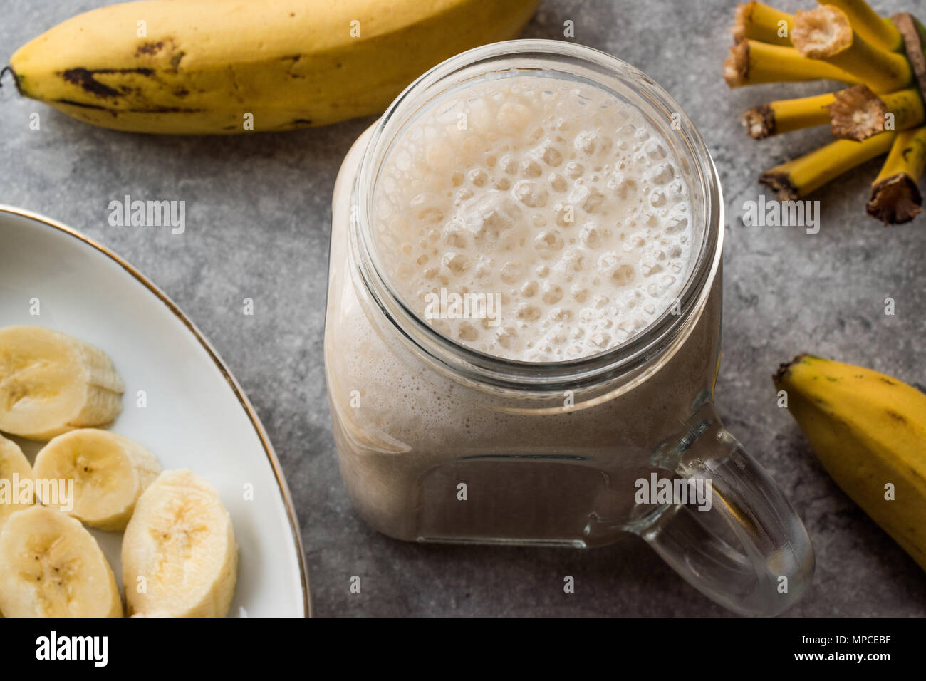 milky-banana-smoothie-in-mason-jar-with-milk-milkshake-organic-fresh