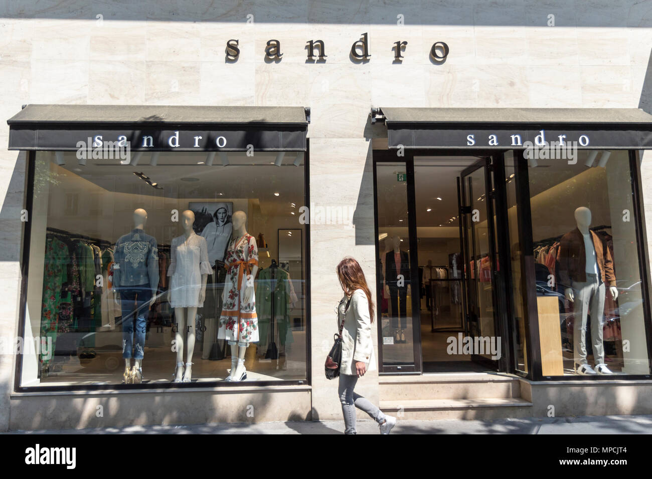 Sandro clothes shop storefront in Paris, France Stock Photo - Alamy