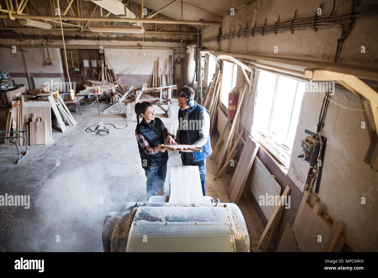 Man planning wood in workshop hi-res stock photography and images - Alamy