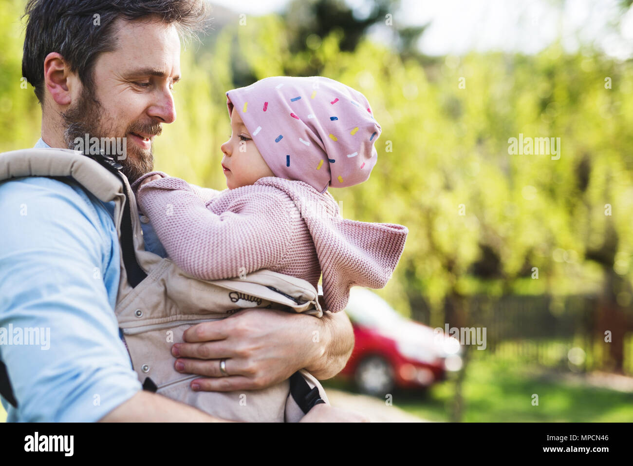 Baby carrier man hires stock photography and images Alamy