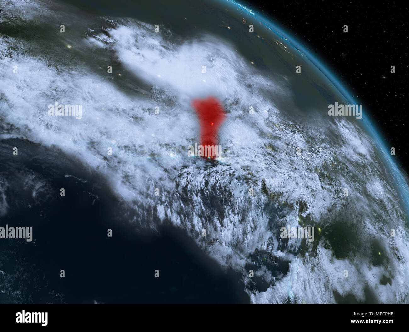 Night above Benin highlighted in red on model of planet Earth in space ...