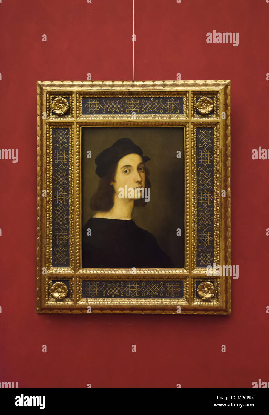 Self-portrait of Italian Renaissance painter Raphael dated from circa 1506 on display in the Uffizi Gallery (Galleria degli Uffizi) in Florence, Tuscany, Italy. Stock Photo